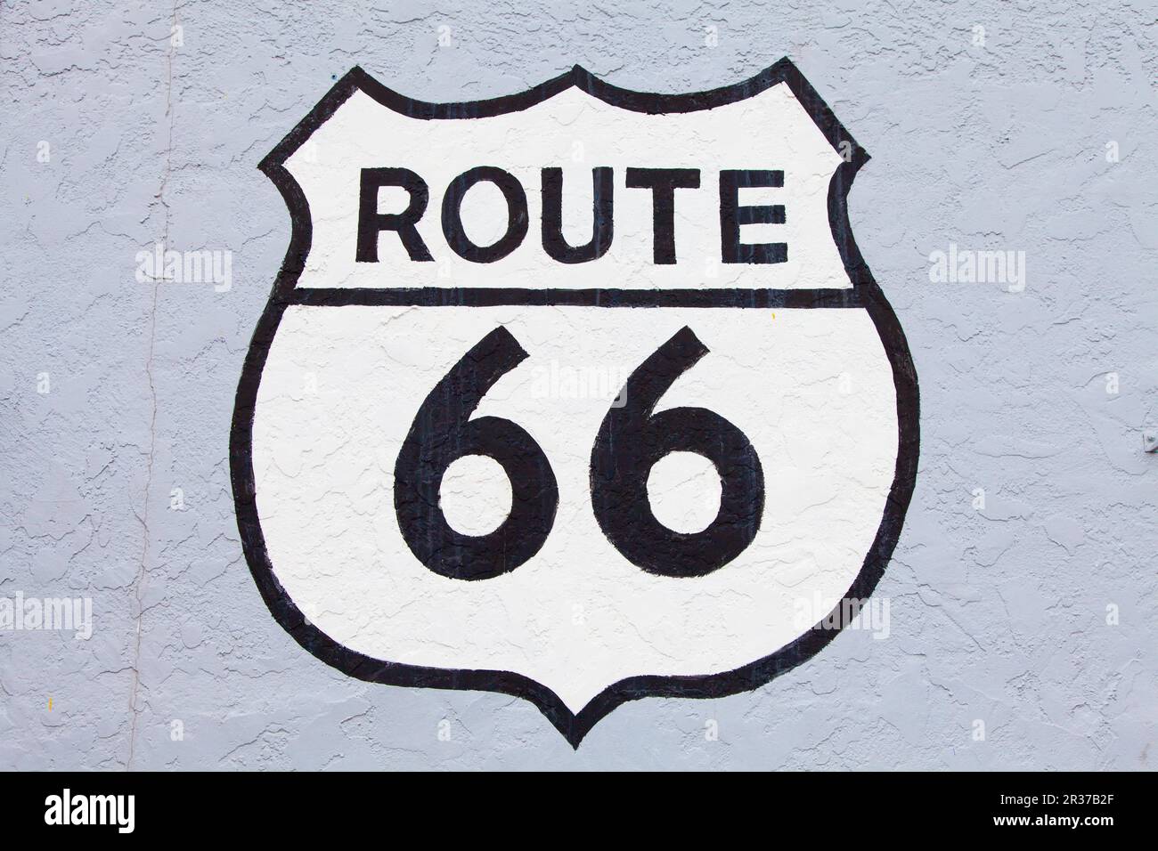 Famoso streetsight Route 66 dipinta su un muro a Flagstaff Foto Stock