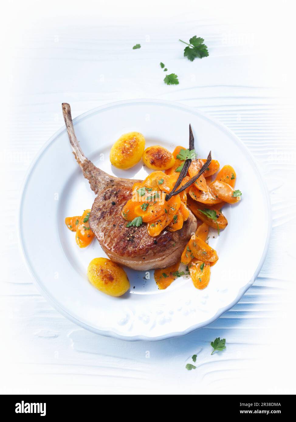 Carote alla vaniglia e un trito di agnello Foto Stock