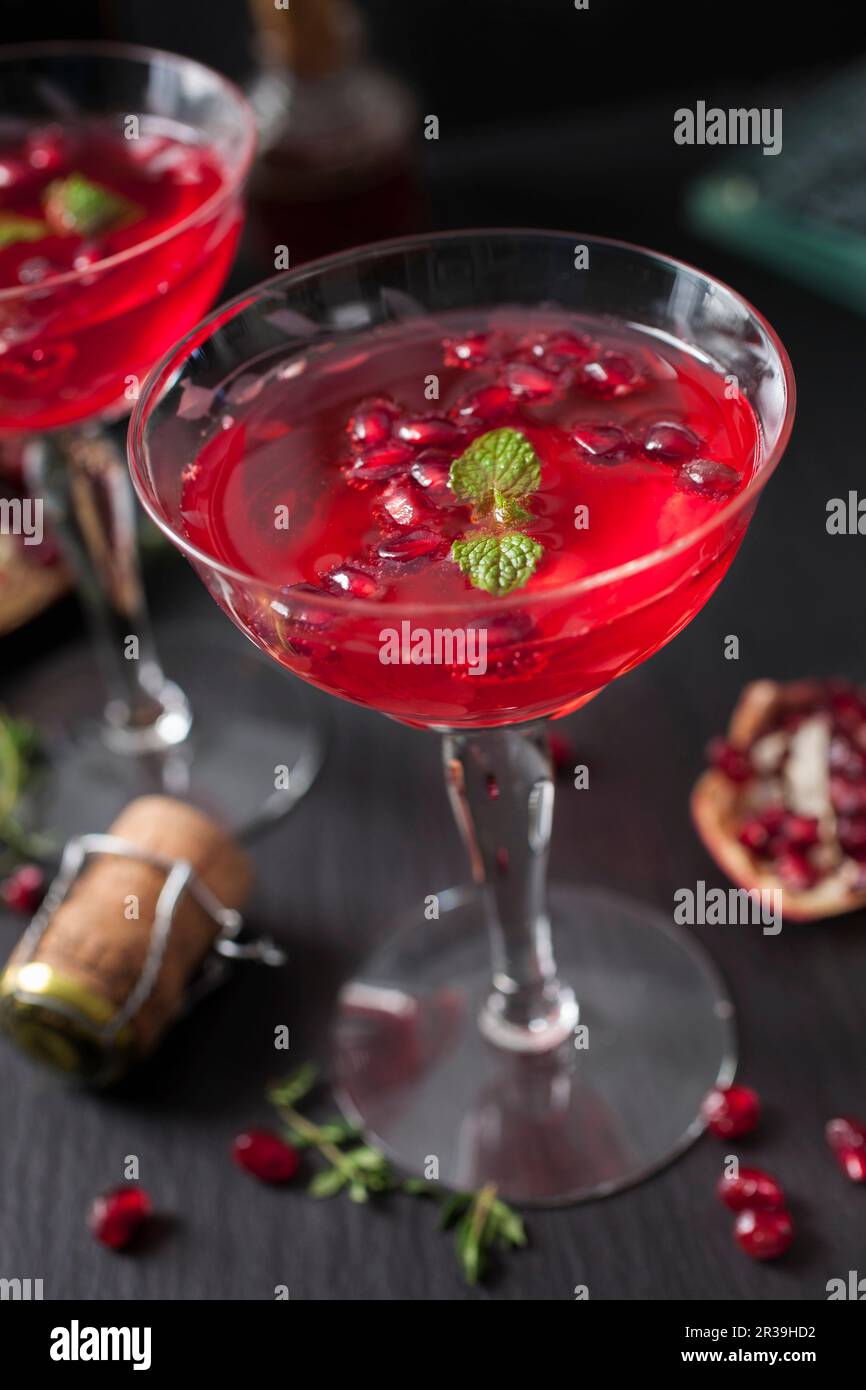 Cocktail di Champagne melograno Foto Stock