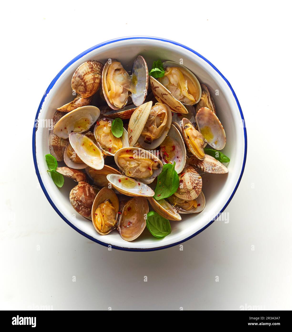 Vongole con basilico Foto Stock