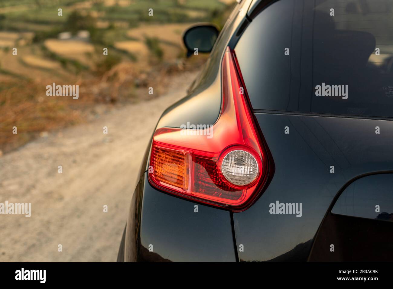 Closeup della luce di stop crossover Nissan Juke Foto Stock