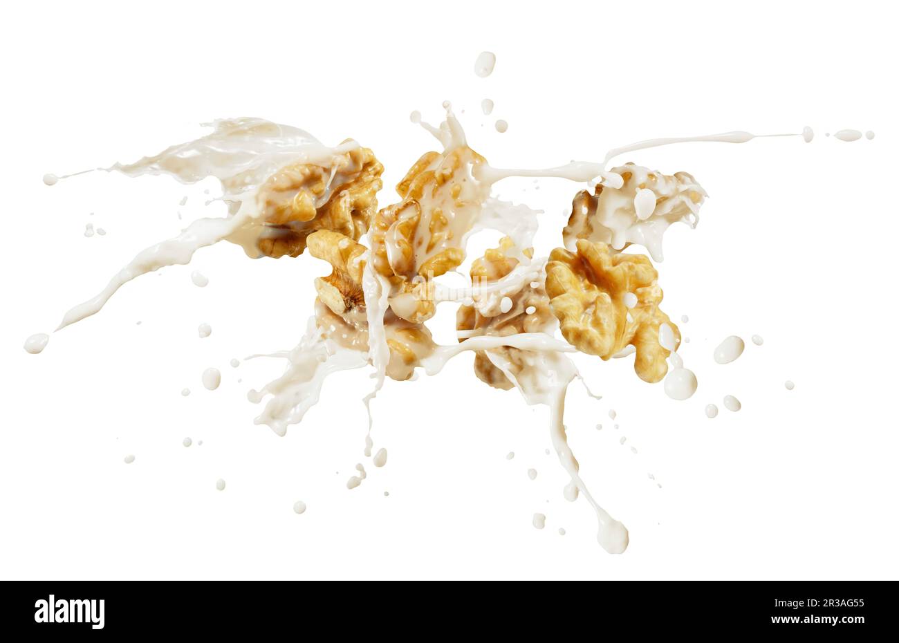 Noci con uno spruzzo di latte Foto Stock