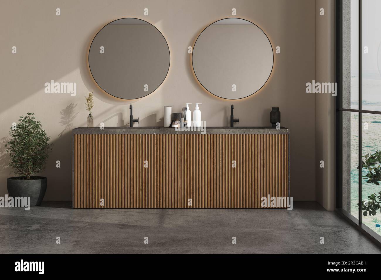 Bagno moderno con pareti beige, lavandino in marmo con doppio specchio e pavimento in cemento grigio. Bagno minimalista con mobili moderni. Vista Foto Stock