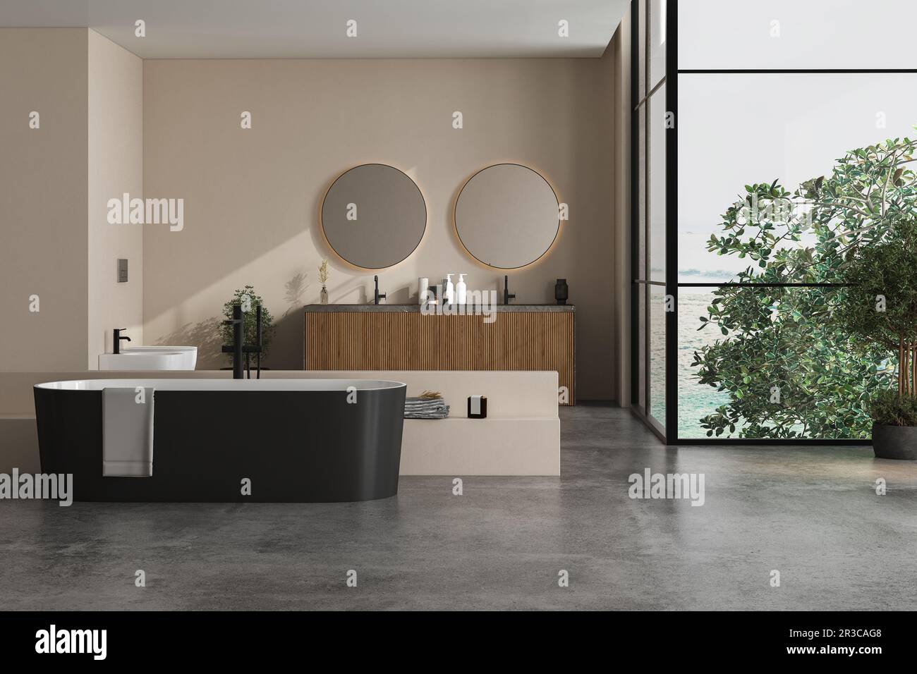 Bagno moderno con pareti beige, lavandino in marmo con doppio specchio, vasca nera e pavimento in cemento grigio. Bagno minimalista con arredi moderni Foto Stock