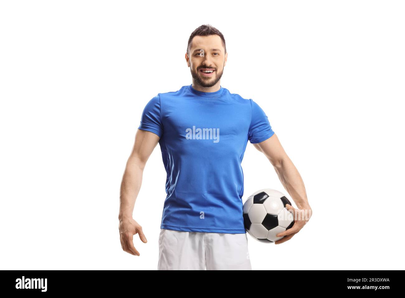 Giocatore di calcio con una palla sotto il braccio isolato su sfondo bianco Foto Stock