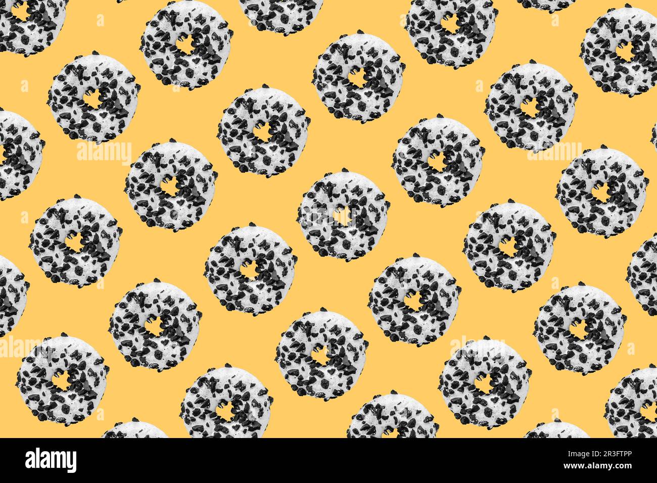 Motivo a ciambella su sfondo giallo Foto Stock