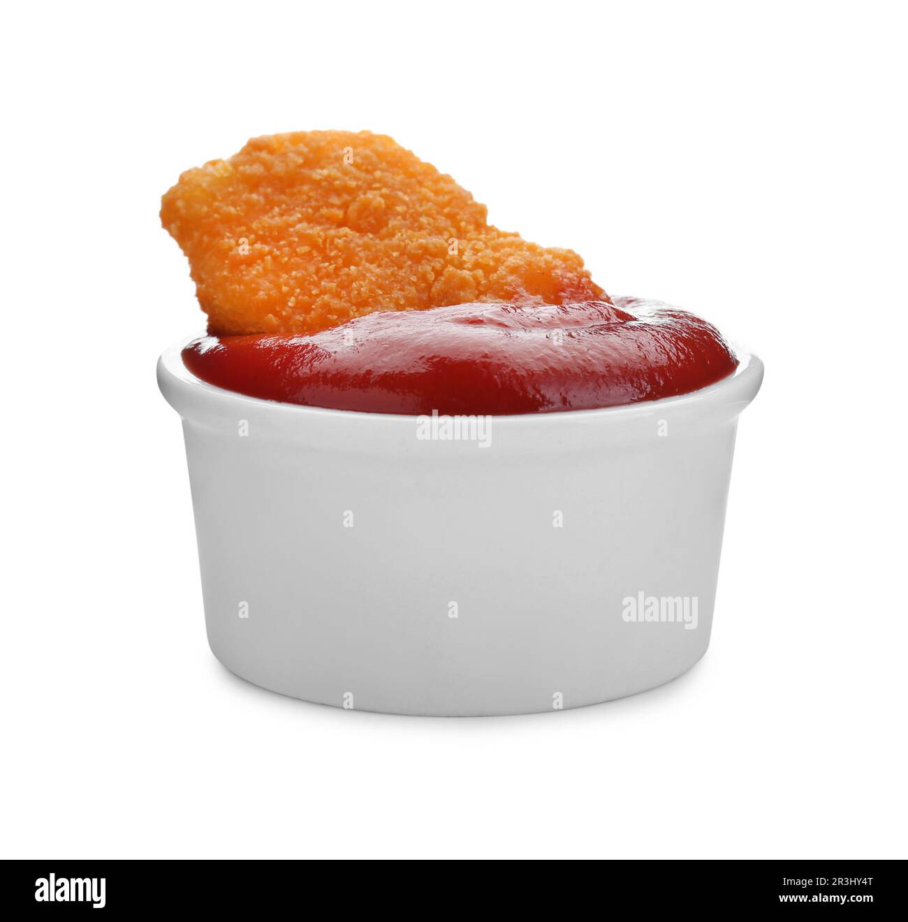 Delizioso bocconcino di pollo con ketchup isolato su bianco Foto Stock