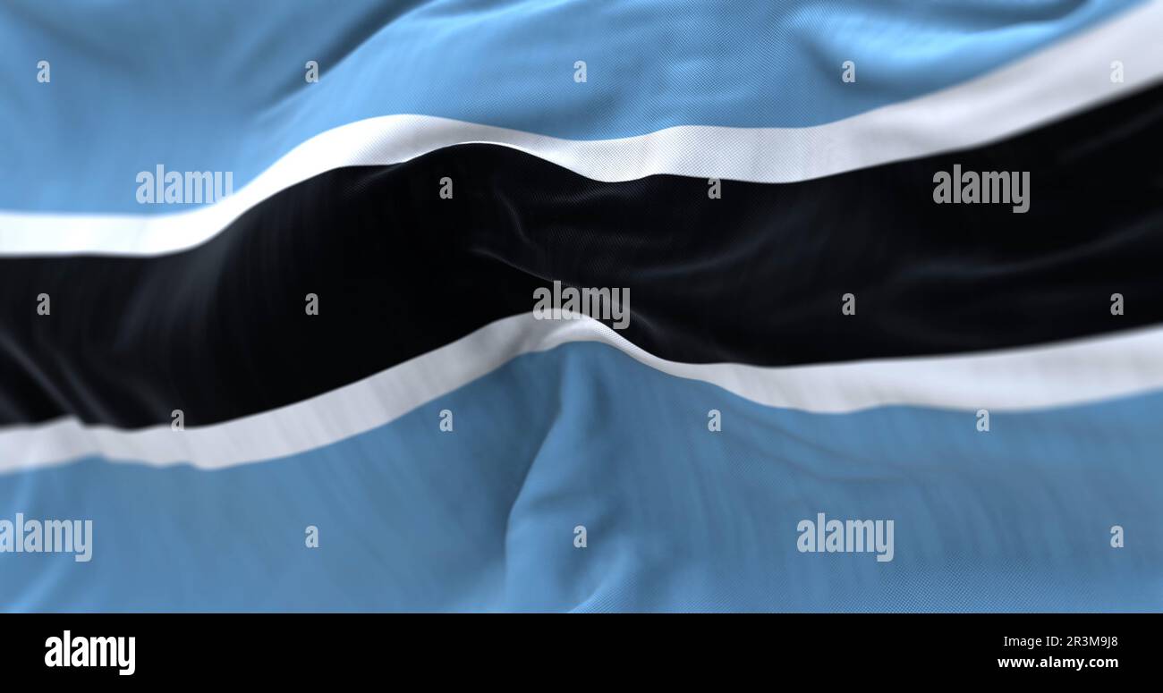 Vista ravvicinata della bandiera nazionale del Botswana che sventola nel vento Foto Stock