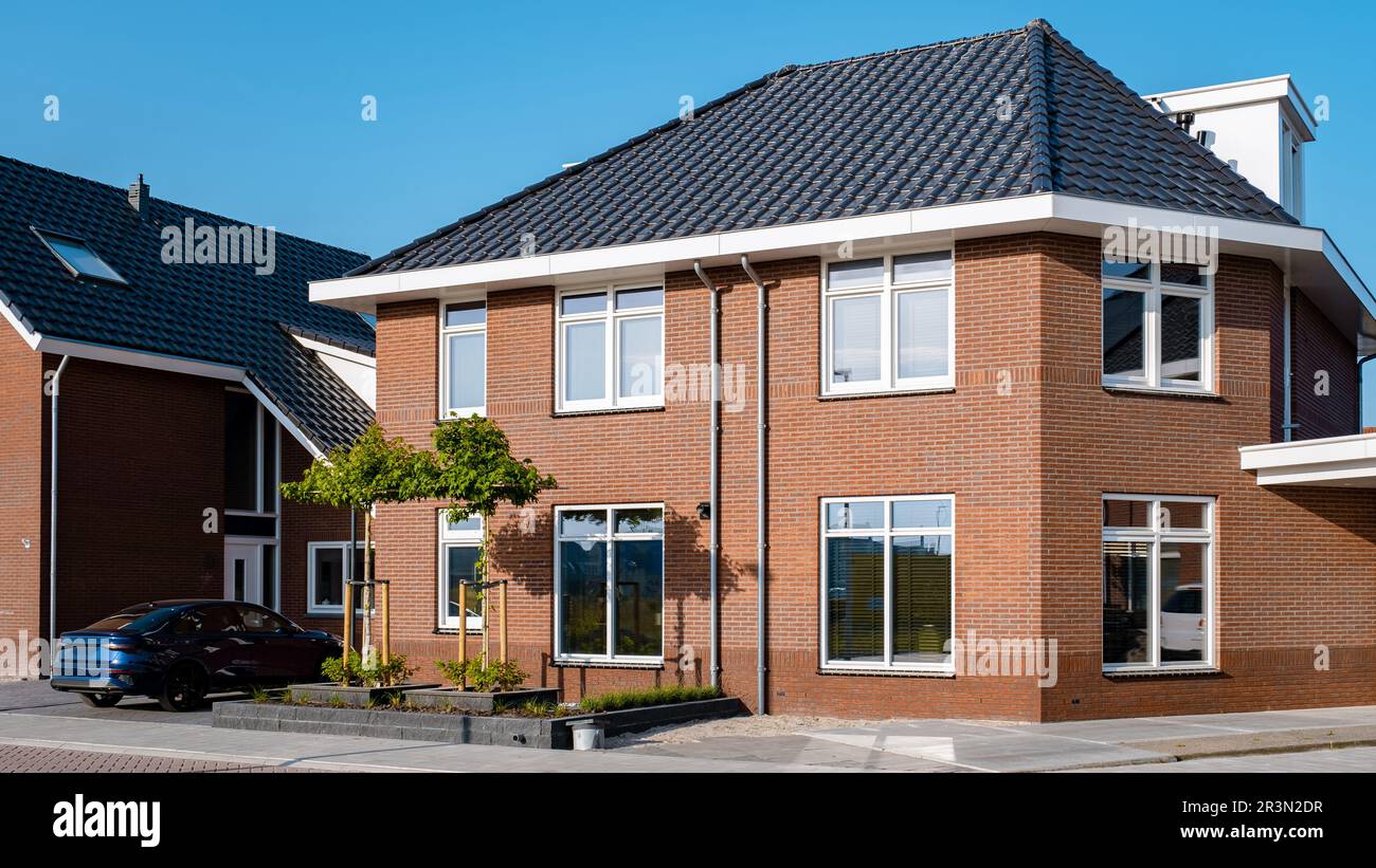Area olandese di Suburban con moderne case familiari nei Paesi Bassi Foto Stock