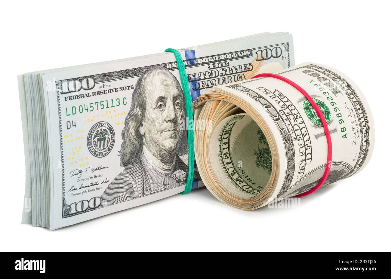 Centinaia di dollari di bollette arrotolate con rubberband Foto Stock