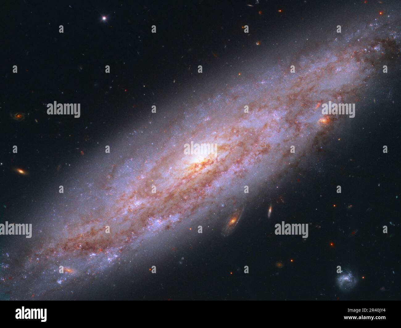 Galassia a spirale NGC 3972, situata a 65 milioni di anni luce di distanza. Foto Stock