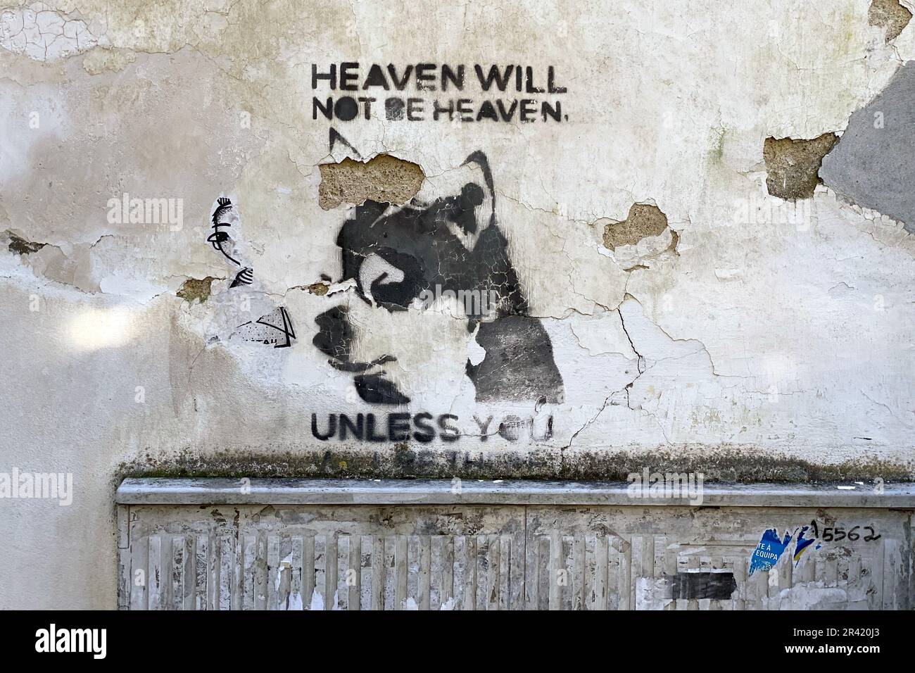 Il paradiso non sarà il paradiso. Dog Street Art Stencil Foto Stock