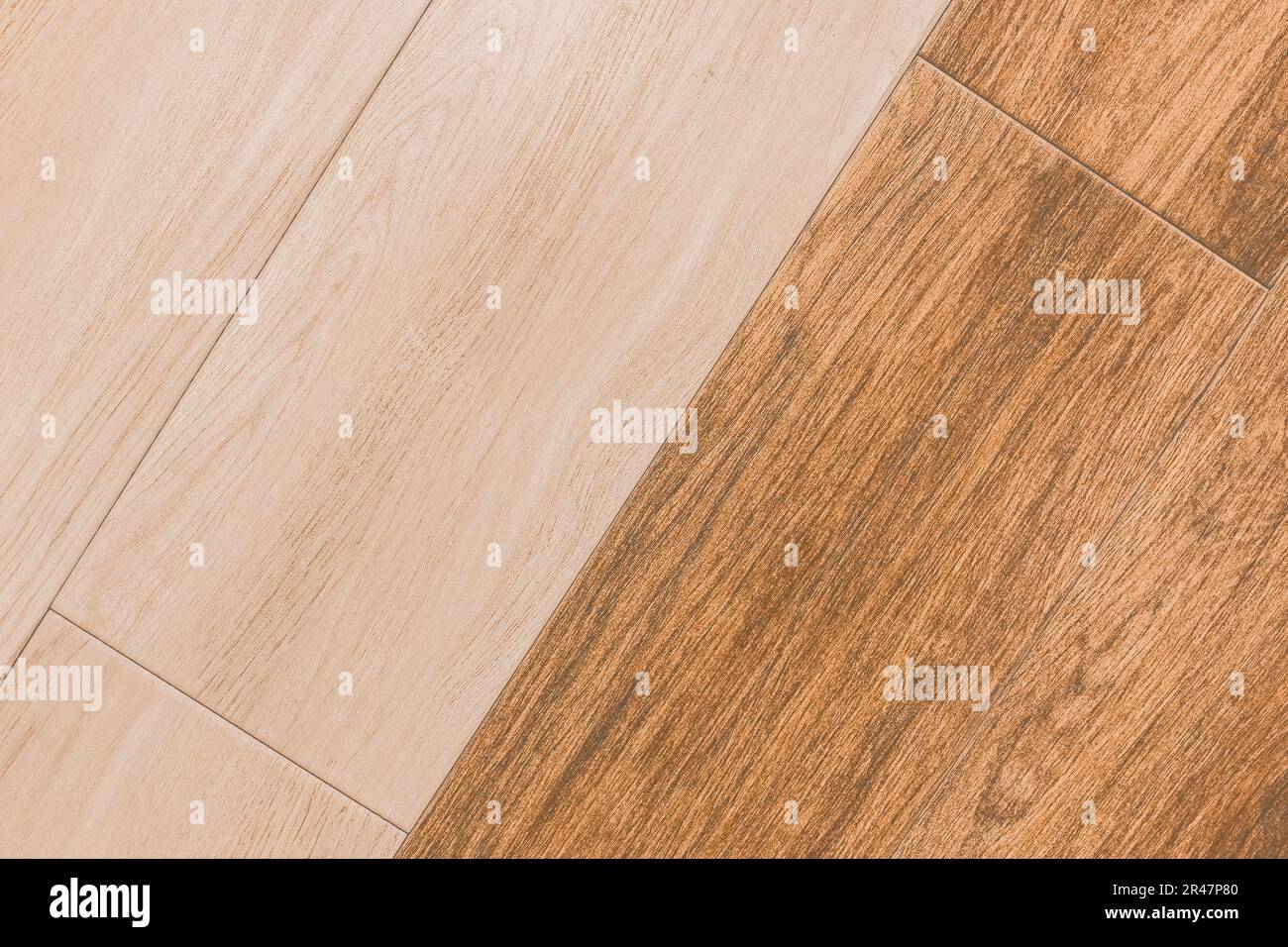 Legno due colori di rivestimento astratto modello chiaro e arancione marrone tavola sfondo struttura pavimento laminato pavimento asse legno. Foto Stock