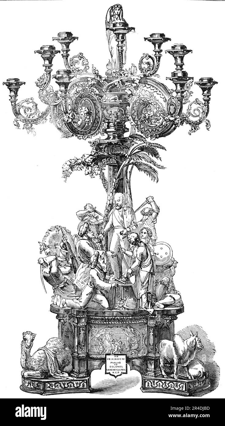 La testimonianza di Lawrence, 1856. Candelabrum presentato a Sir Henry Montgomery Lawrence, "...Presidente del Consiglio di Amministrazione per gli Affari del Punjaub [Punjab]". Le cifre rappresentano: '...lo stato di anarchia che esisteva nel Punjaub prima dell'introduzione del dominio britannico...il conflitto tra le forze britanniche e quelle Sikh, che portò alla conquista del paese da parte dei primi...la pacificazione del Punjaub. Sir Henry Lawrence è rappresentato nell'atto di ricevere da un villager affghano e da un capo Sikh le loro armi; in cambio del quale sta per p Foto Stock