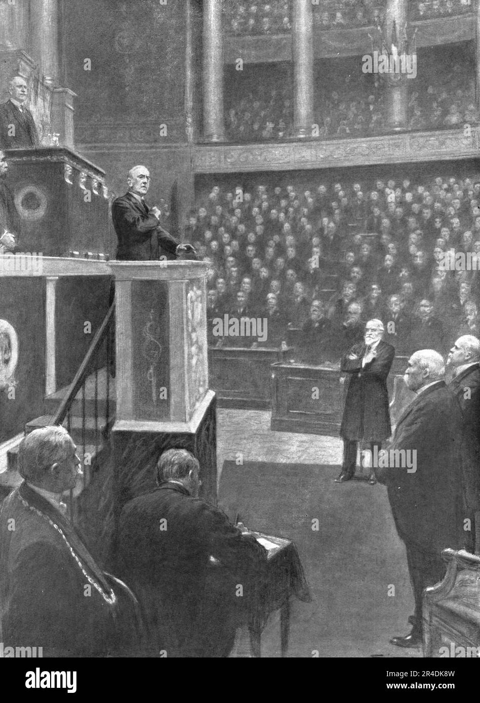 "La Paix Victorieuse; la Reception de M Wilson a la Chambre Francais: Le president Wilson a la tribune du Palais-Bourbon, le 3 fevrier 1919", 1919. From "l'Album de la Guerre 1914-1919, Volume 2" [l'Illustration, Paris, 1924]. Foto Stock