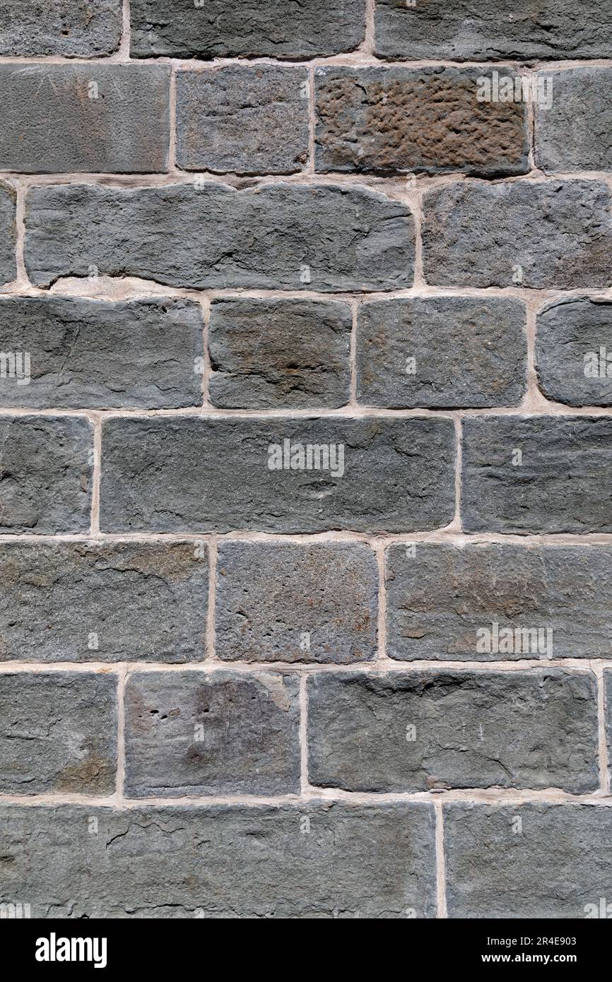 Primo piano del muro di pietra naturale. Foto Stock