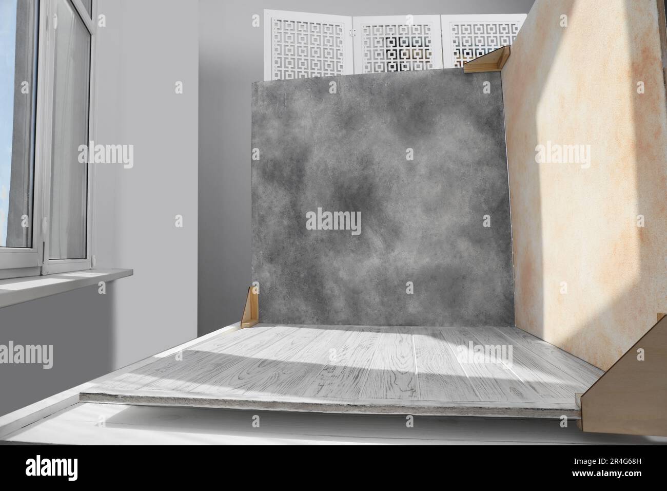 Sfondi a due lati sul tavolo in studio fotografico Foto Stock