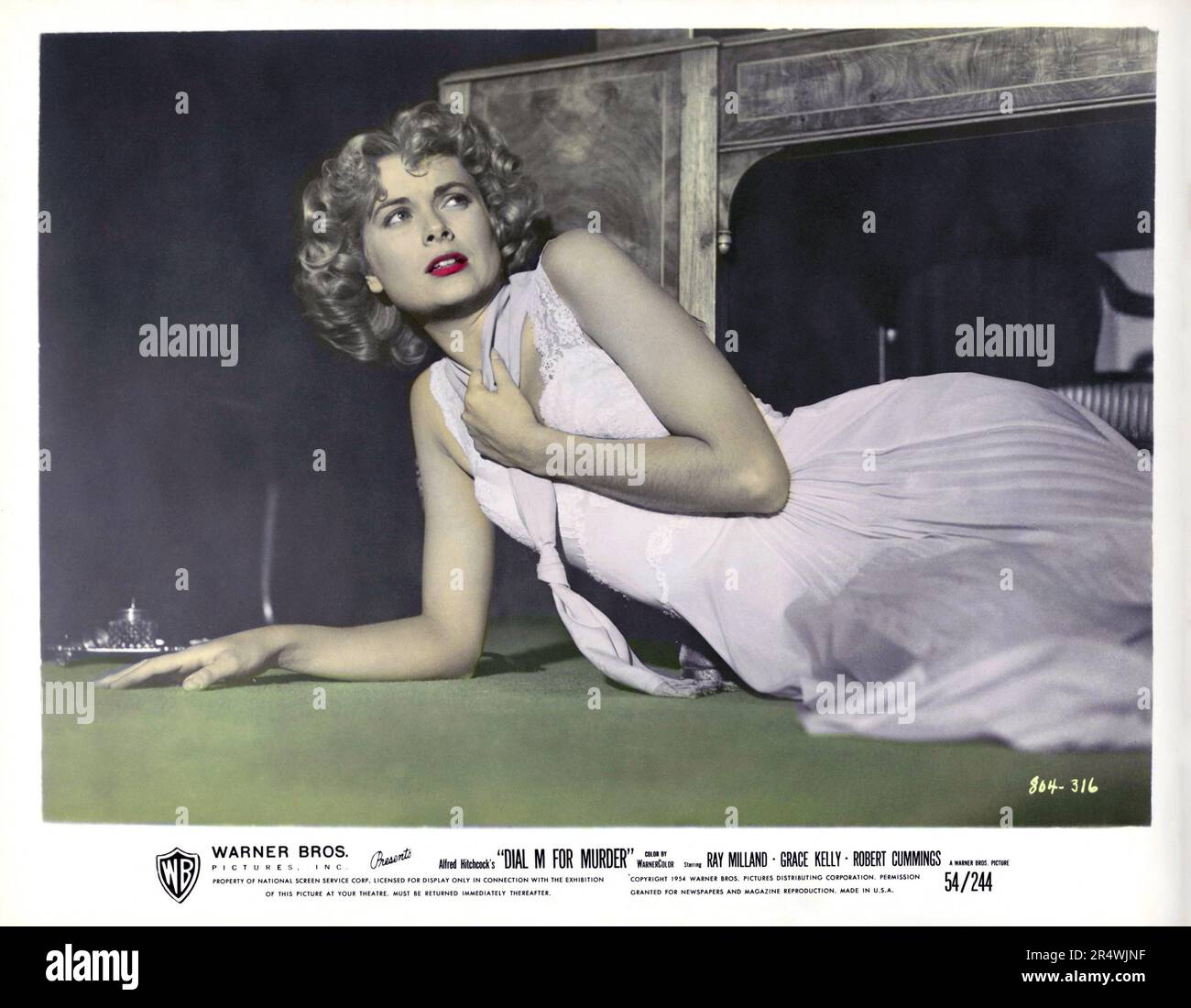 Comporre il numero M per omicidio è un 1954 crimine americano film thriller diretto da Alfred Hitchcock, interpretato da Ray Milland Grace Kelly, e Robert Cummings. Il film è stato adattato da un successo di tappa play da Frederick Knott. Foto Stock