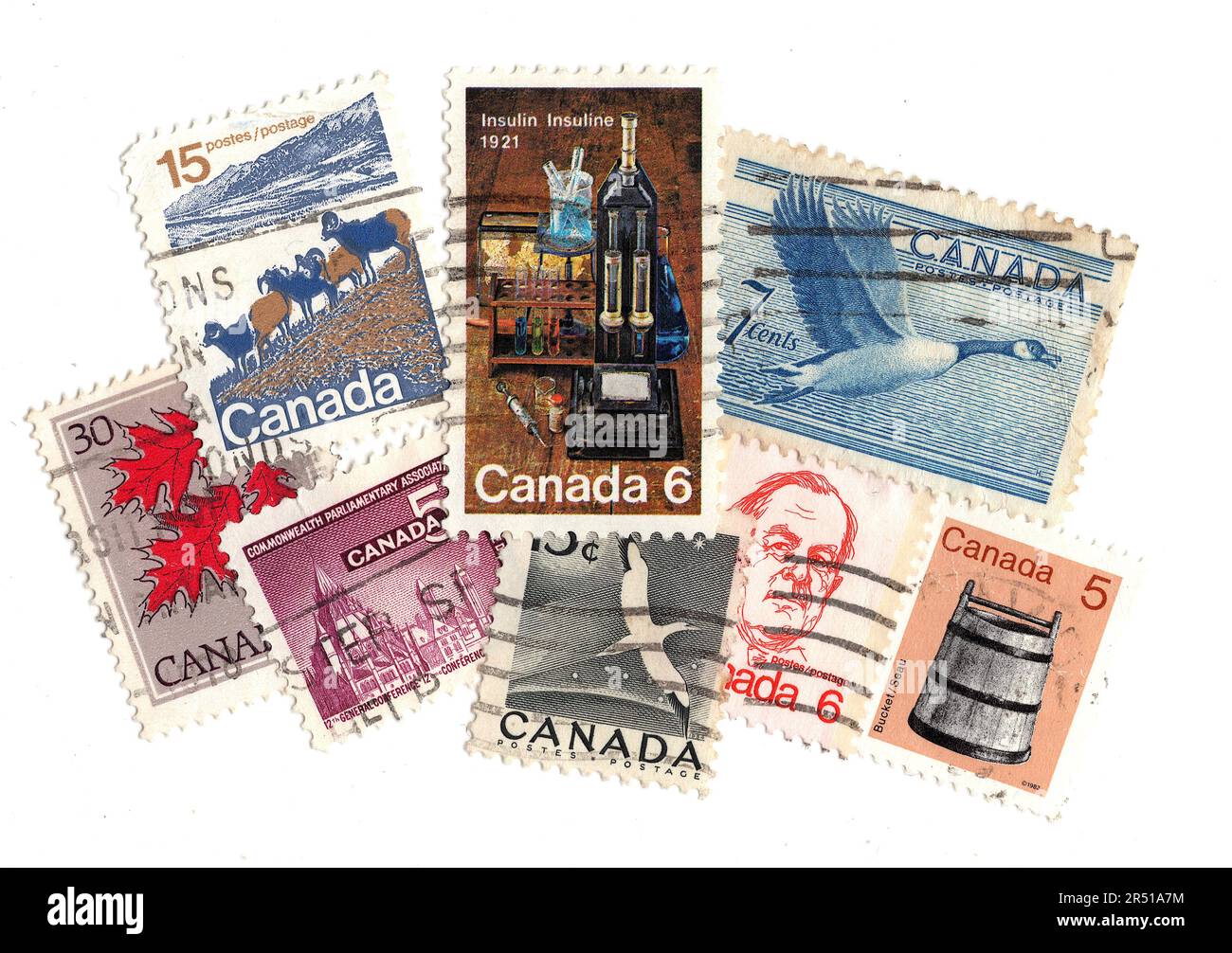 Francobolli vintage del Canada che presentano un'eredità isolata su uno sfondo bianco. Foto Stock