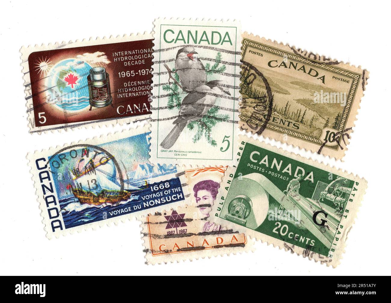 Francobolli vintage del Canada che presentano un'eredità isolata su uno sfondo bianco. Foto Stock