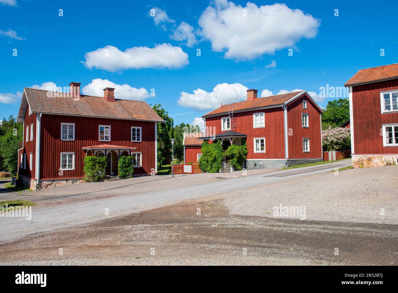 Case rosse Falu nel villaggio di Lund, Småland, Svezia Foto Stock