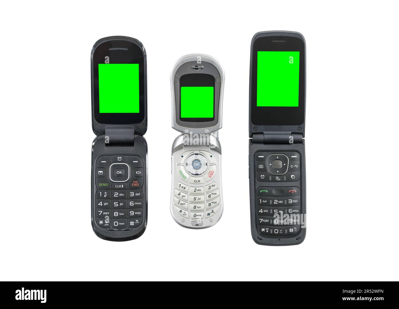 Tre vecchi telefoni cellulari flip isolato con tasti croma schermi verdi. Foto Stock