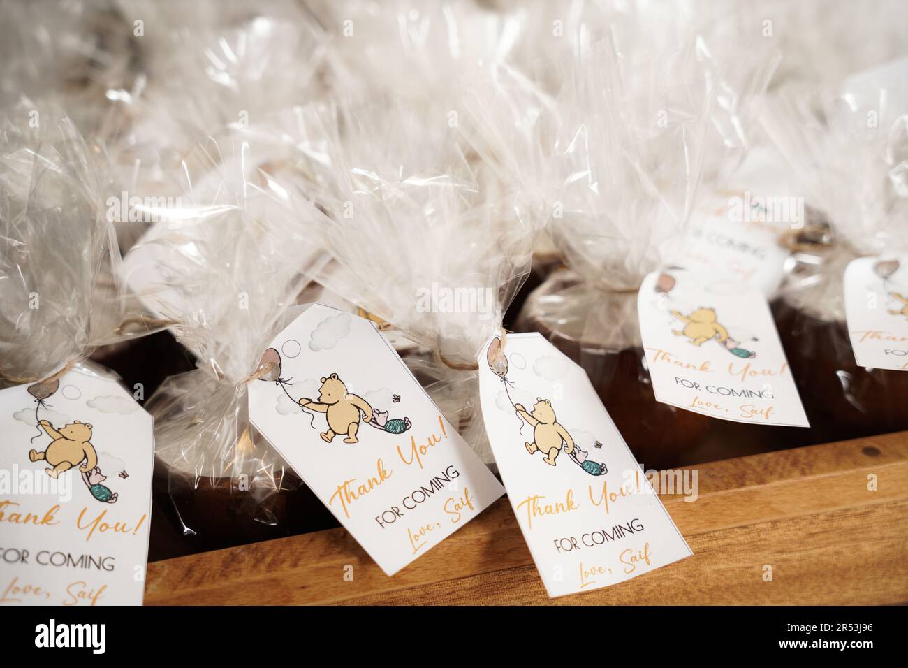 Grazie per aver scelto di ricevere i gadget. Winnie the Pooh party merchandise. Winnie the Pooh tema compleanno goodie borse. Festa di compleanno dei ragazzi. Foto Stock