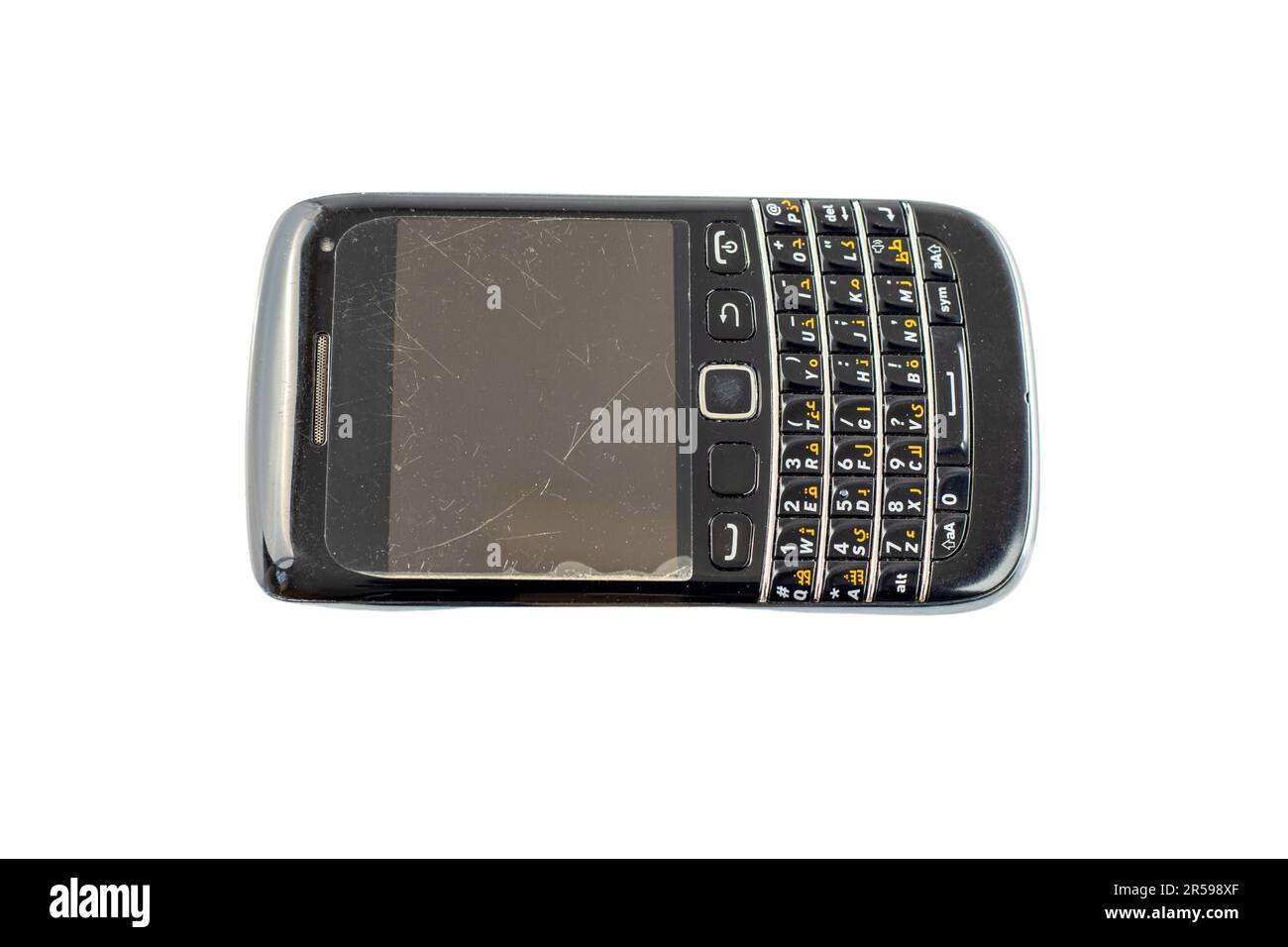 Vecchio e usato telefono nero con tastiera isolata su sfondo bianco Foto Stock