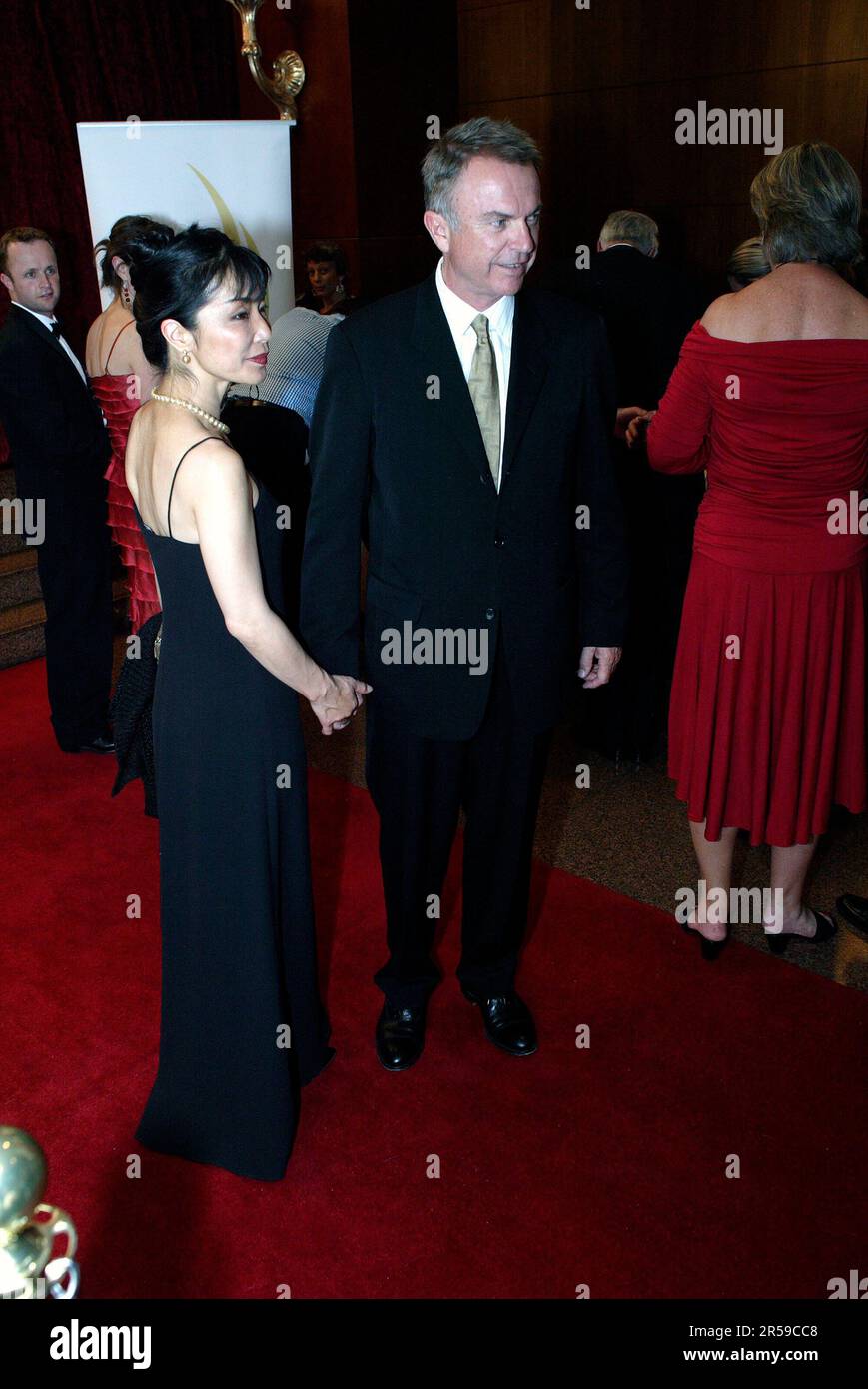 Sam Neill e sua moglie, Noriko Watanabe, alla cena di beneficenza di Hollywood Nights in aiuto della Prince of Wales Hospital Foundation Four Seasons Hotel 23.11.06 Sydney, Australia Foto Stock