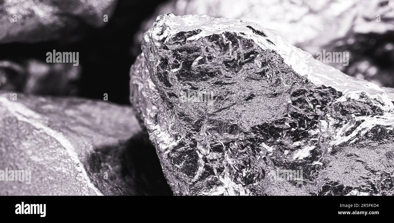 diverse pietre di palladio, un elemento chimico che a temperatura ambiente si contrae allo stato solido. Metallo utilizzato nell'industria. Messa a fuoco spot Foto Stock