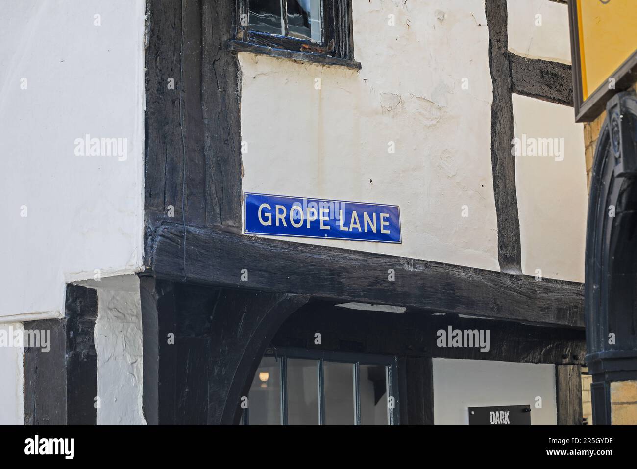 Un cartello stradale vicino al centro città che dice 'grope Lane', Shrewsbury, Shropshire, Inghilterra, Regno Unito Foto Stock