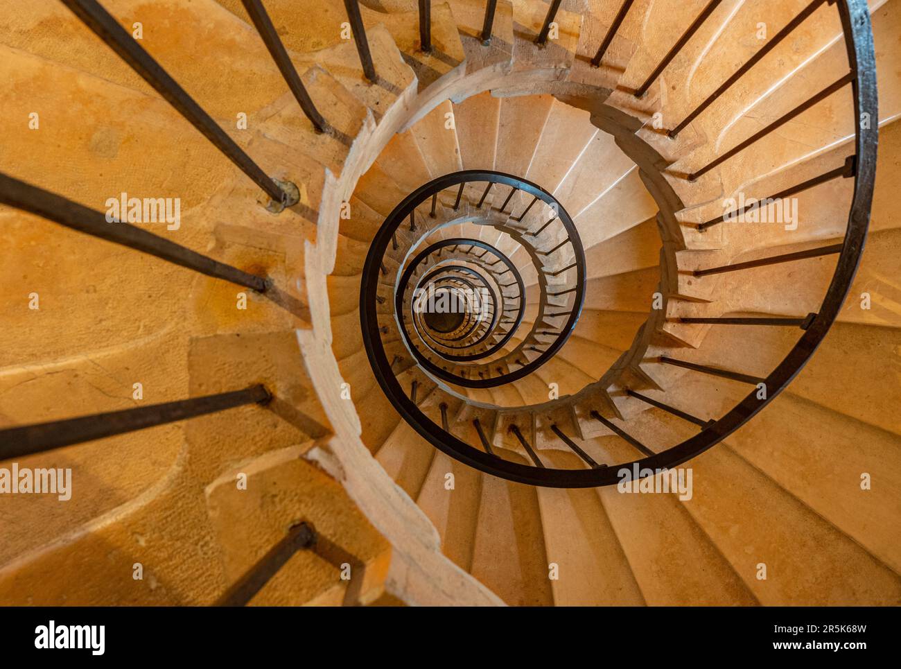 Scala a chiocciola in Palazzo Ducale (Urbino) Foto Stock