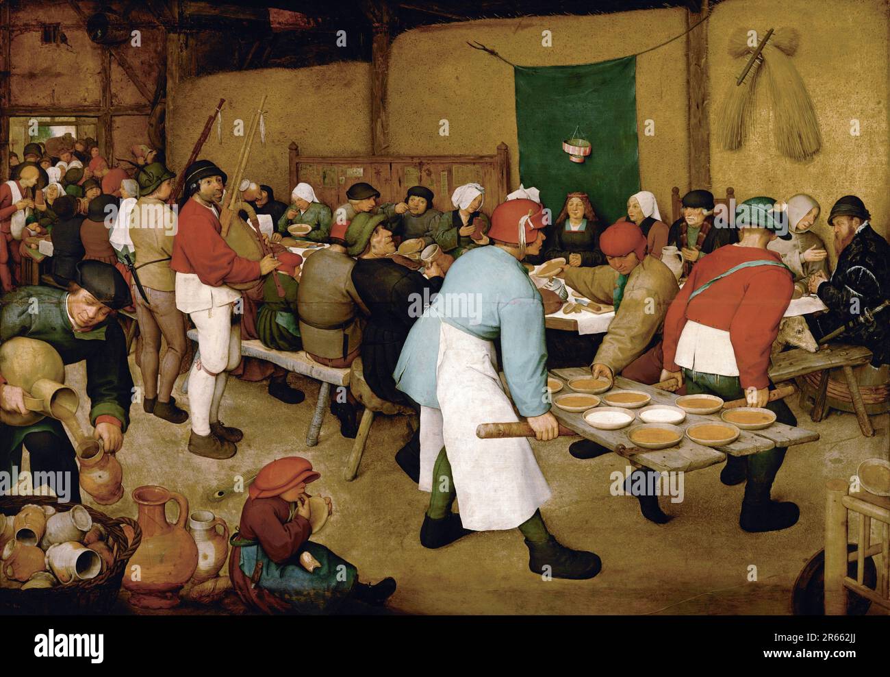 Il matrimonio contadino dipinto dal pittore rinascimentale olandese Pieter Breughel il Vecchio nel 1566-69. Breughel è stato il pittore più importante del Rinascimento olandese e fiammingo. La sua scelta di soggetti fu influente, rifiutò ritratti e scene religiose a favore di scene locali e contadine. Foto Stock