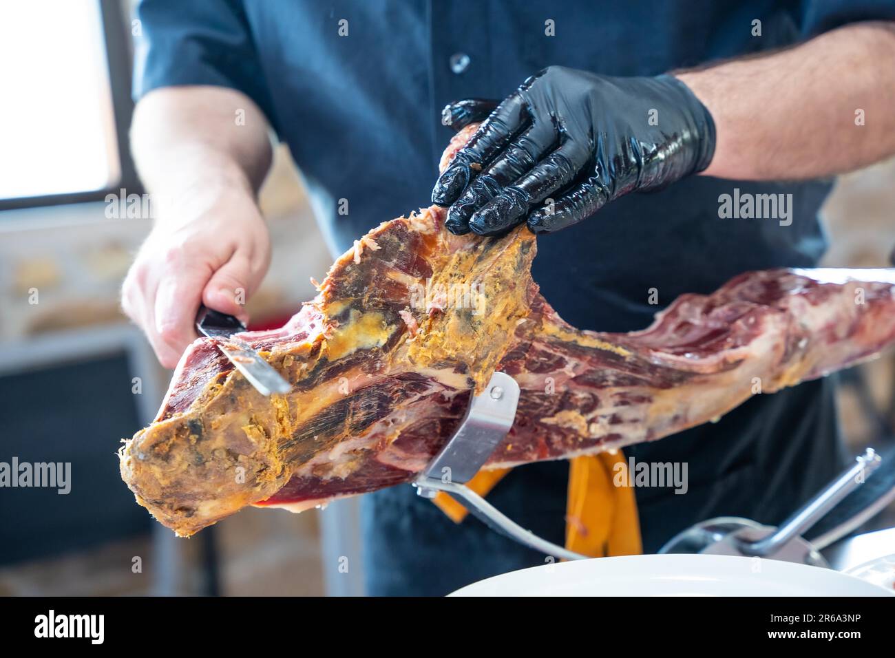 Una taglierina per prosciutto serrano ad un evento Foto Stock