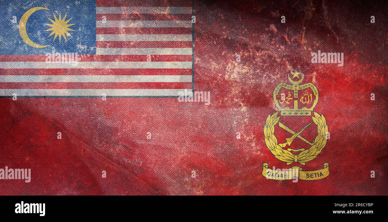 Vista dall'alto della bandiera retrò dell'Esercito Malesiano della Malesia con texture grunge. Viaggio malese e concetto patriota. nessun flagpole. Layout del piano, design. Allarme Foto Stock