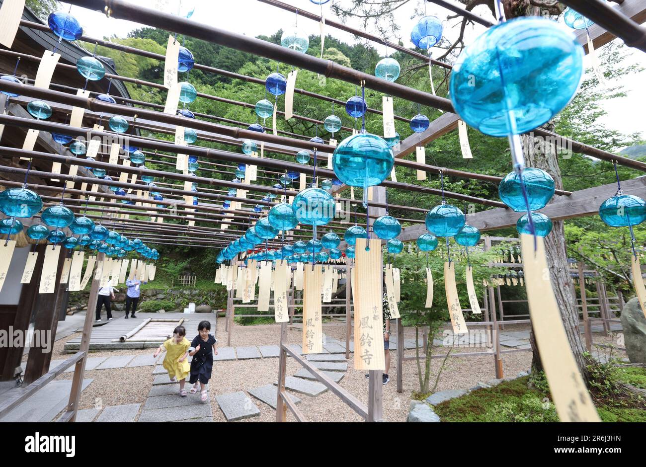 Over 2,000 wind chimes are hung in the corridor and swaying in the wind