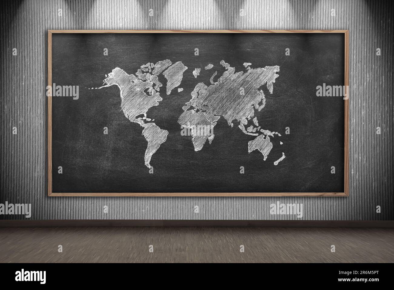 lavagna con disegno mappa del mondo sulla parete in camera grigia Foto Stock