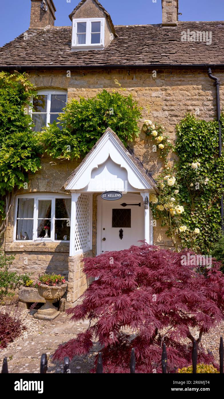 Lower Slaughter cottage, Cotswold, tradizionale pietra costruita casa pittoresca, Inghilterra, Regno Unito, Foto Stock
