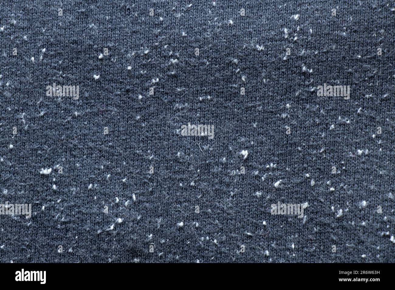 sfondo tessuto grigio chiaro come macro di sfondo Foto Stock