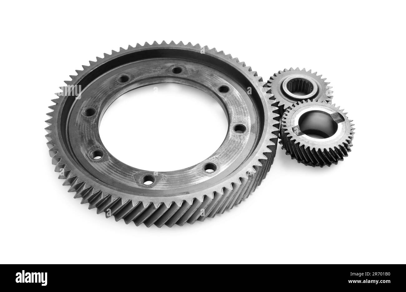 Diversi ingranaggi in acciaio inox su sfondo bianco Foto Stock