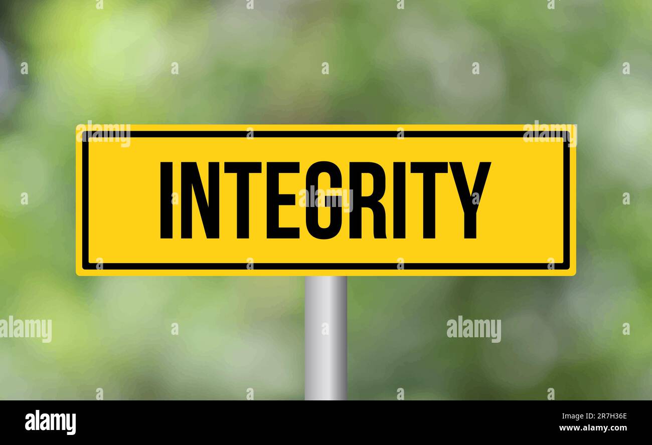 Segnaletica stradale Integrity su sfondo sfocato Foto Stock