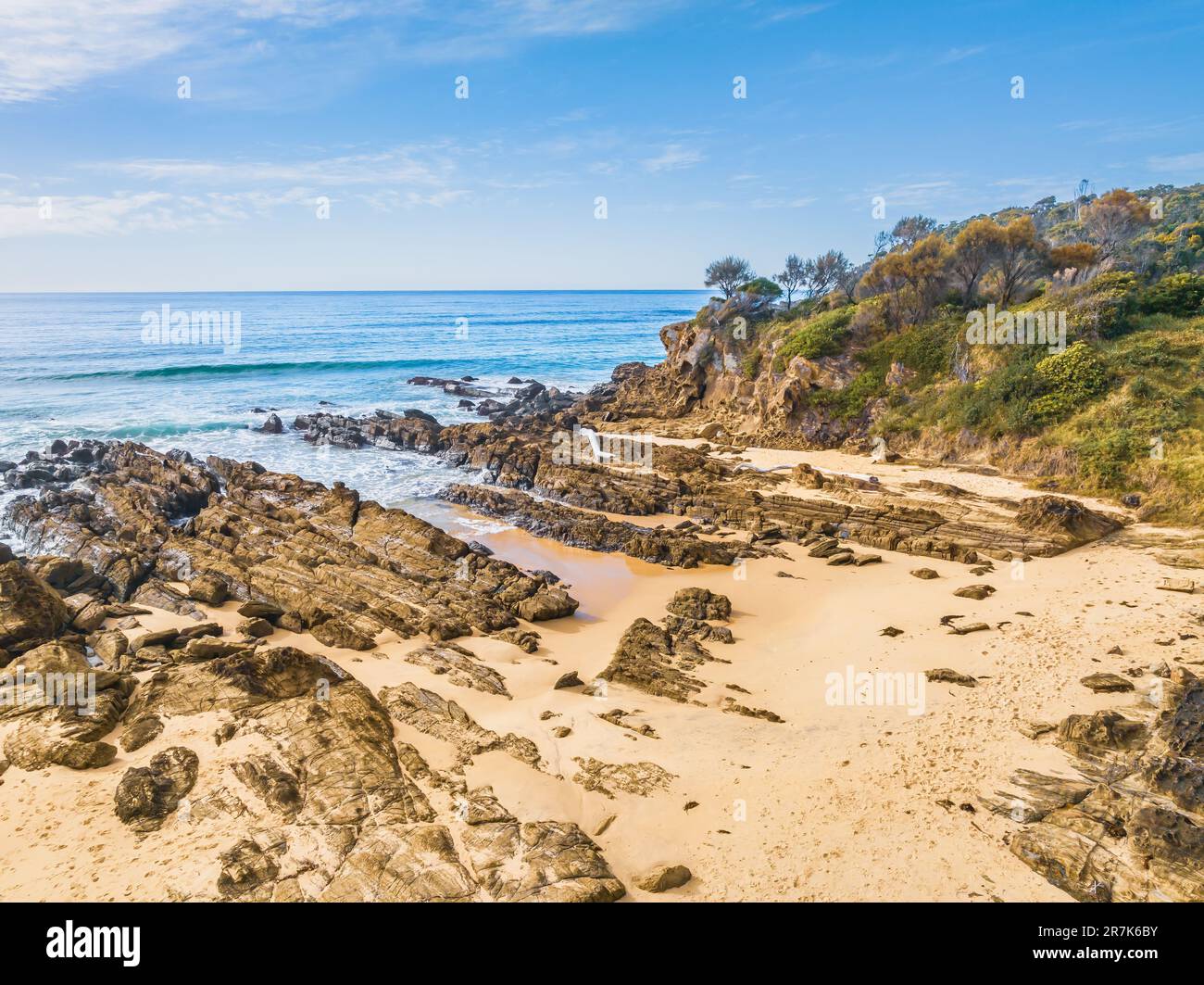 Esplorare Cuttagee Beach sulla costa della costa di Sapphire, nella costa meridionale del New South Wales, Australia Foto Stock