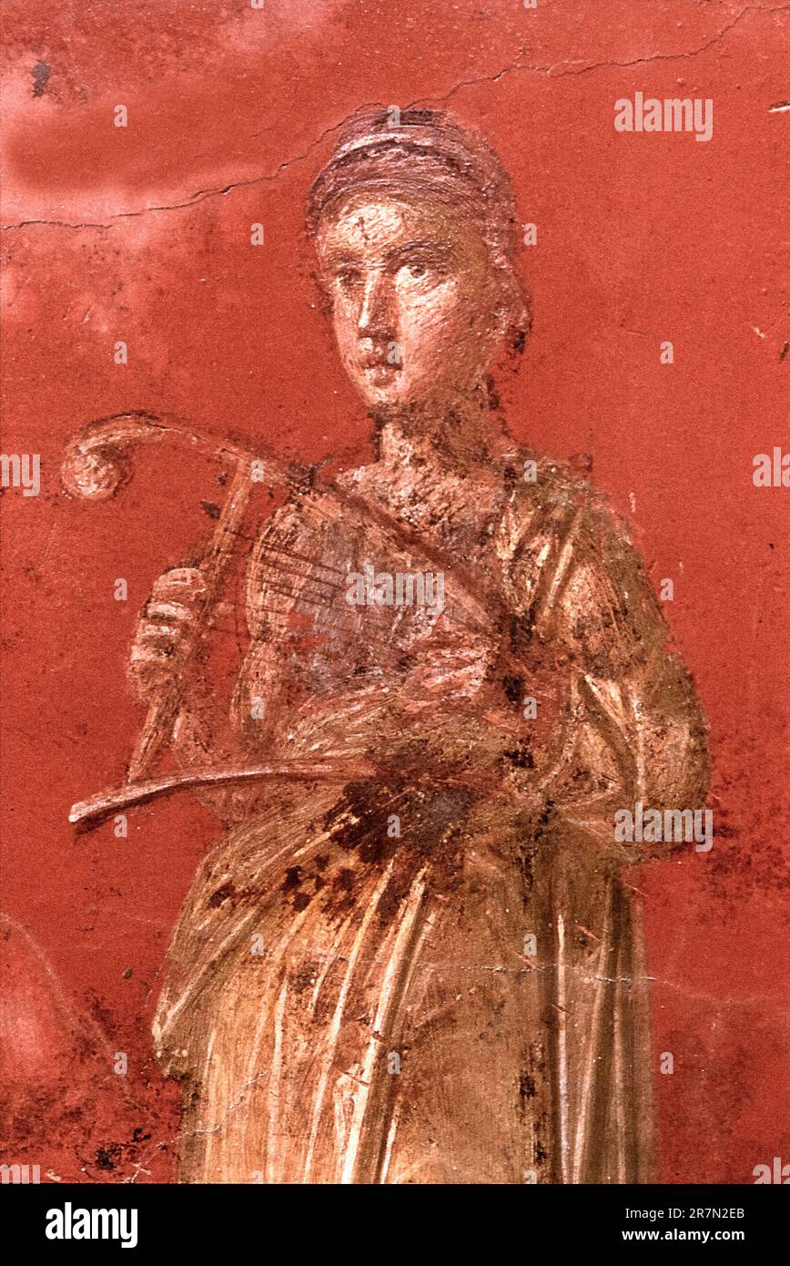 Italia Campania Pompei villa Moregine, gli scavi archeologici - Triclinium A, parete ovest. Terpsichore la Muse della danza e del coro con una cithara. Foto Stock