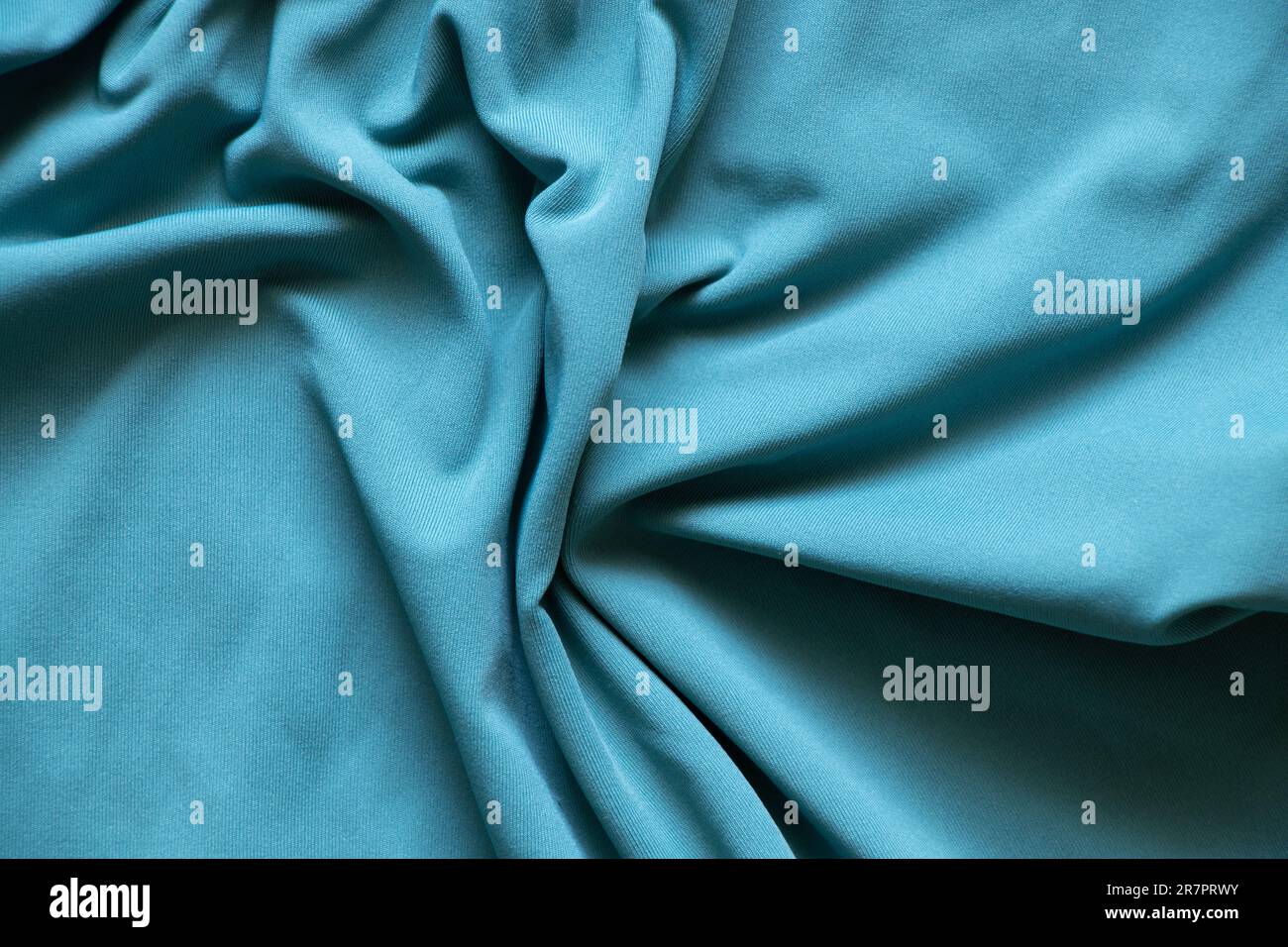 tessuto di seta semplice turchese come primo piano dello sfondo Foto Stock