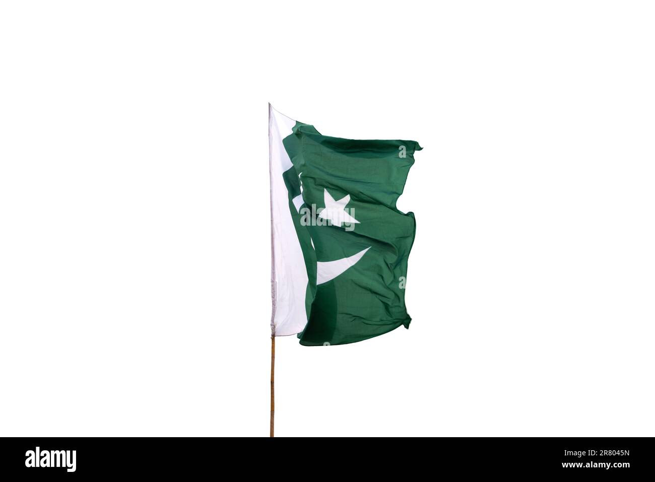 La bandiera nazionale del Pakistan vola nel cielo. Foto Stock