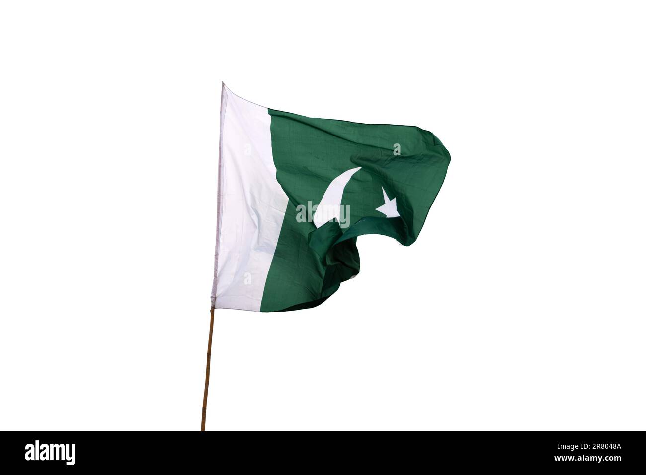 La bandiera nazionale del Pakistan vola nel cielo. Foto Stock