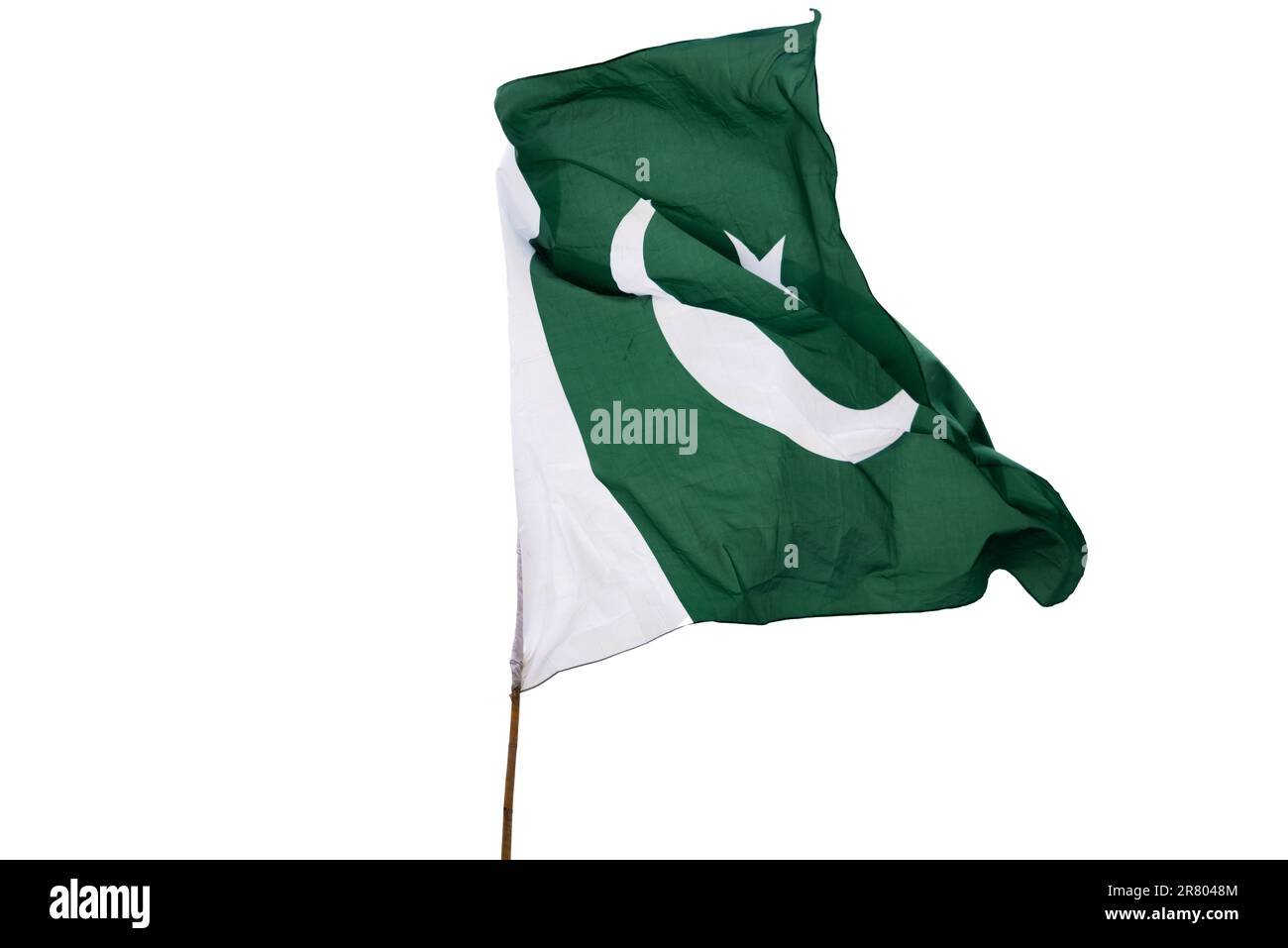 La bandiera nazionale del Pakistan vola nel cielo. Foto Stock