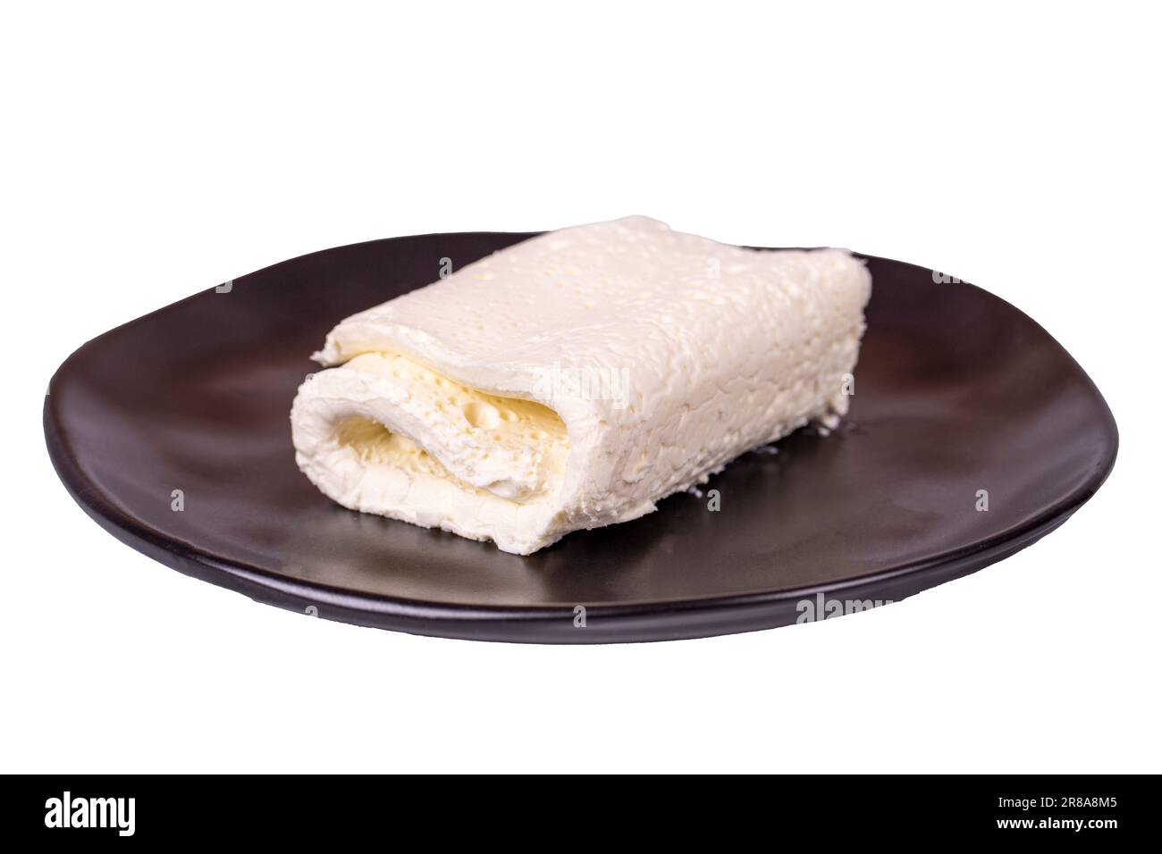 Crema coagulata isolata su fondo bianco. Crema coagulata (crema al burro) per la colazione turca. nome locale: inek kaymak Foto Stock