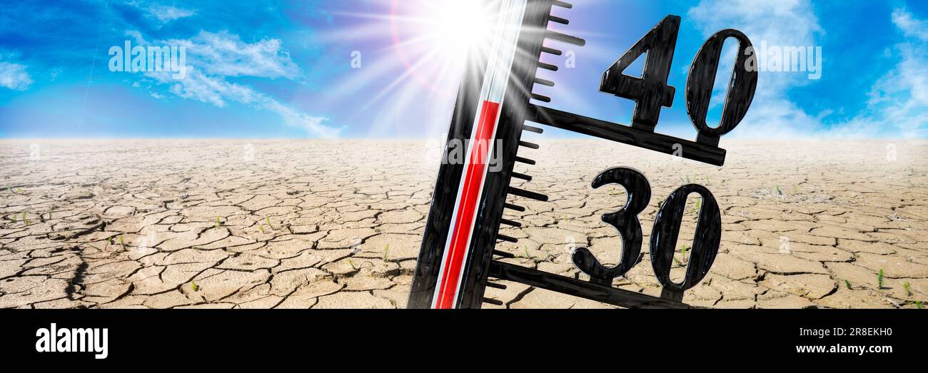 il termometro mostra una temperatura elevata nel calore estivo con secchezza e mancanza di acqua nel campo Foto Stock