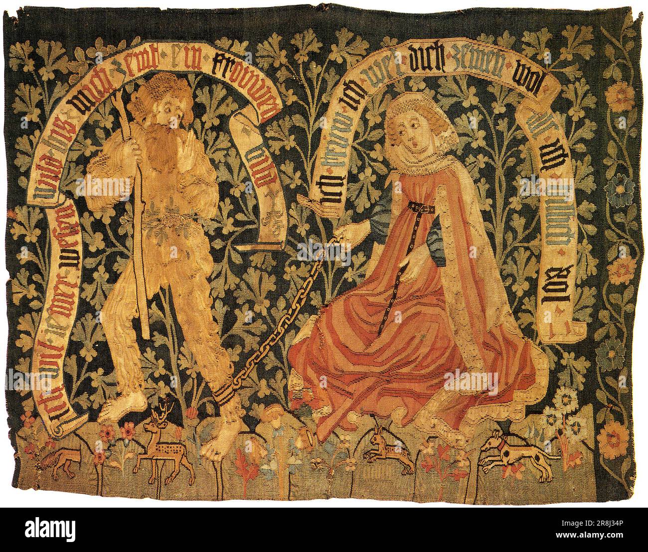 Woodwose o Wildman. Arazzo del tardo XV secolo da Basilea, che mostra un boscaiolo domato da una signora virtuosa l'uomo selvaggio, l'uomo selvaggio dei boschi, o boscaiolo o boscaiolo è una figura mitica Foto Stock